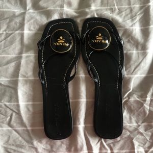 Prada black round logo sandals